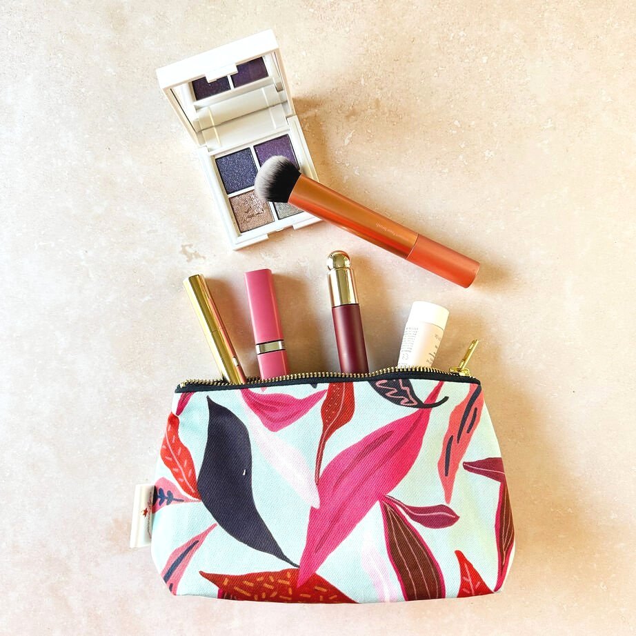Joyful small makeup bag perfect for keeping your beauty essentials organised on the go