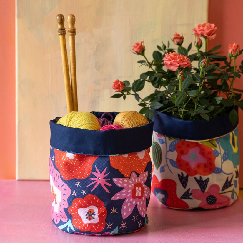 Colourful fabric storage basket adding fun and organisation to your living space.