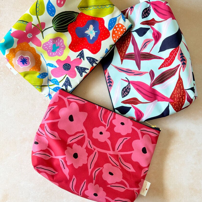 Colourful large cosmetic bags with vibrant floral patterns