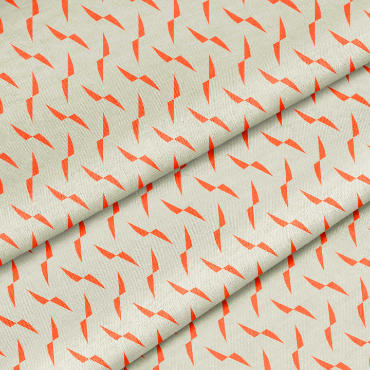 Orange geometric fabric in organic cotton